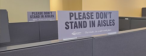 Please Don’t Stand in Aisles signage
