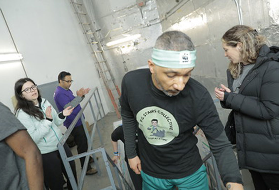 2024 CN Tower Climb for Nature - William Sanchez at Finish Line - Universal Logistics Universal & YOU Internal Newsletter - May 2024